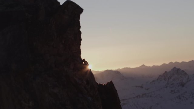 pan from interesting rock into alpine sunset silvretta mountains piz buin