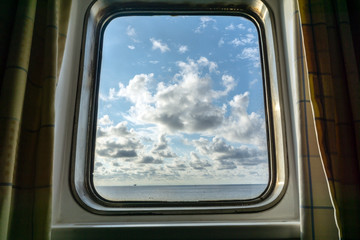 View from a cabin window of a construction barge at oil field
