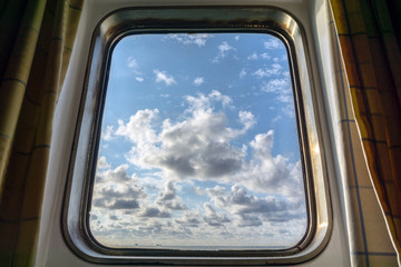 view from the cabin window of a construction barge