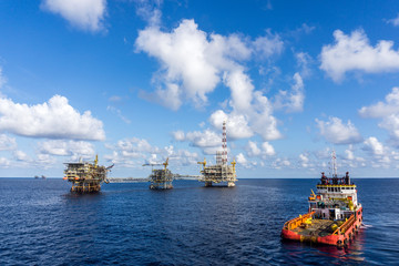 Anchor handling tugboat at oilfield