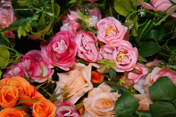 Fake flower and Floral background. rose flowers made of fabric. The fabric flowers bouquet. Colorful of decoration artificial flower