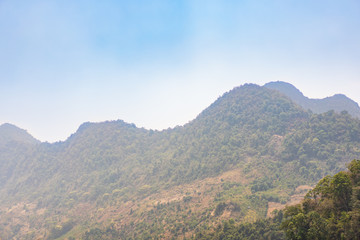 Mountain and forest in Asia landscape during the beautiful day background.