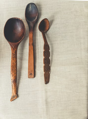 rustic flat lay,wooden rustic spoons on linen background