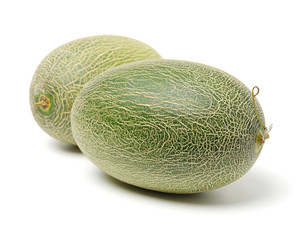 Netted melon on white background 