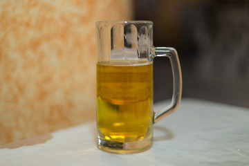 Glass of beer on the table