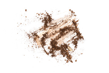 Brown face powder isolated on brown background.