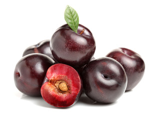 Plums on white background