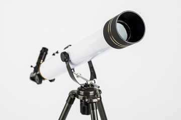 white telescope on tripod isolated on white background.