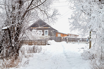 Russian village in winter covered snow