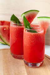 Vitamin watermelon smoothie for vegans on a yellow background. Super food for detox	