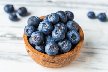 Close up of fresh organic blueberries on white background