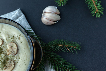 Mushroom Cream Vegetarian Soup on a dark background. Close up.