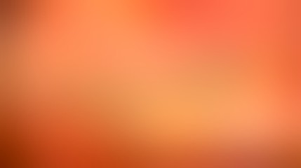 Autumn colors abstract blurred background. Juicy orange soft texture.