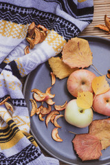 Plate with apples. Autumn layout. Fruit apples. Autumn picture. . Apples and autumn leaves