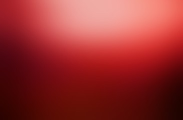 Defocus red deep background with diffused low light top. Bloody smooth abstract texture. Valentines day simple backdrop.