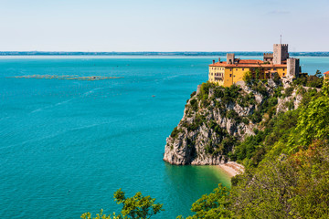 Gulf of Trieste. High cliffs Between boats, karst rocks and ancient castles. Duino. Italy