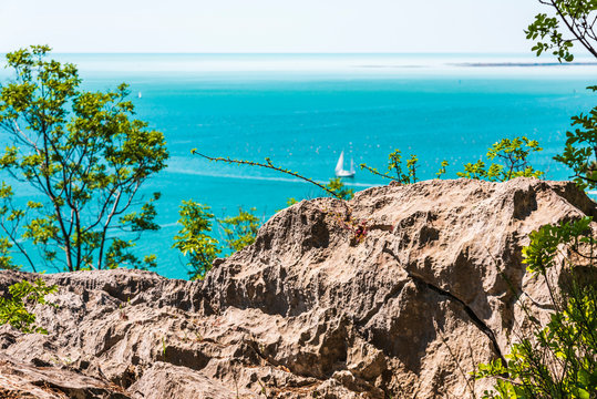 Gulf of Trieste. High cliffs Between boats, karst rocks and ancient castles. Duino. Italy