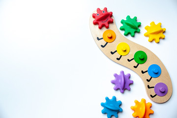 Fototapeta na wymiar Montessori Kid toy colorful plastic snake isolated on white background