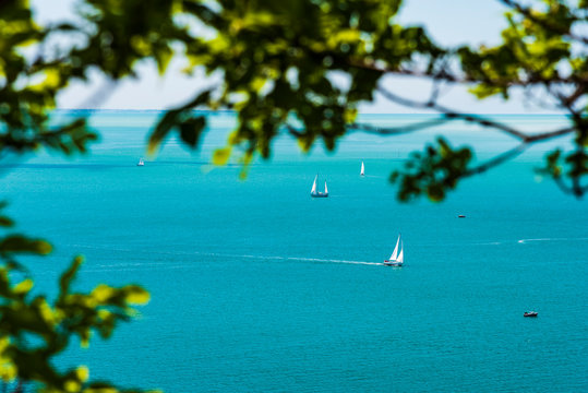 Gulf of Trieste. High cliffs Between boats, karst rocks and ancient castles. Duino. Italy