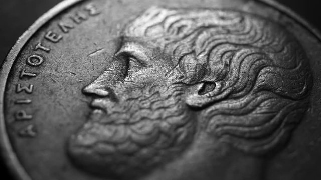 Close up of a detailed old coinso;iu