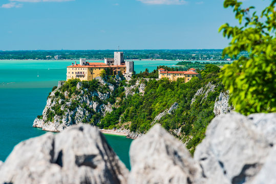 Gulf of Trieste. High cliffs Between boats, karst rocks and ancient castles. Duino. Italy