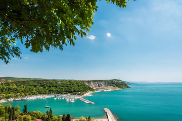 Gulf of Trieste. High cliffs Between boats, karst rocks and ancient castles. Duino. Italy