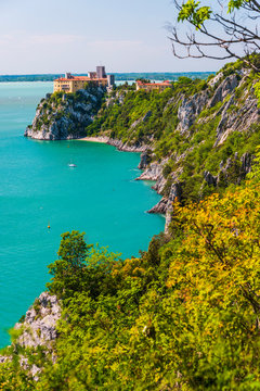 Gulf of Trieste. High cliffs Between boats, karst rocks and ancient castles. Duino. Italy