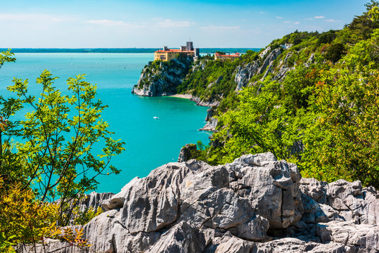 Gulf of Trieste. High cliffs Between boats, karst rocks and ancient castles. Duino. Italy