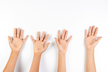 Many kid hands up on white background