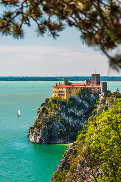 Gulf of Trieste. High cliffs Between boats, karst rocks and ancient castles. Duino. Italy
