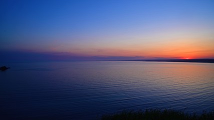Obraz premium 北の岬に沈む夕日の情景＠北海道