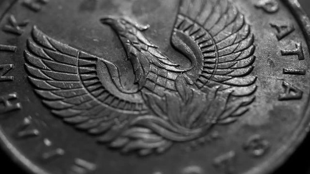Close up of a detailed old coinso;iu