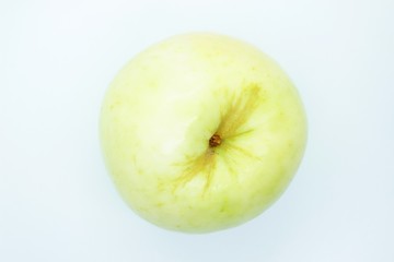 Green apple located on a white background
