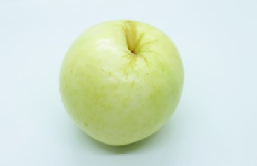 Green apple located on a white background