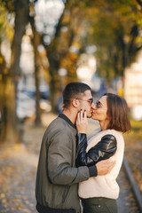 couple hanging out in the city during autumn