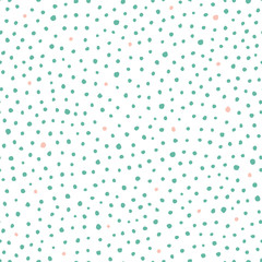 Seamless vector hand drawn dot pattern with hand painted irregular green and pink dot in wavy movement. Graphic and modern design for scrapbooking, stationary, fashion and packaging design.