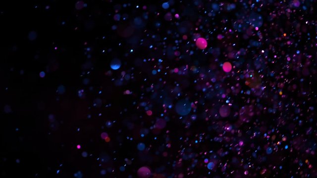Blue Glitter Background in Super Slow Motion at 1000fps. Shooted with High Speed Cinema Camera in 4K Resolution.