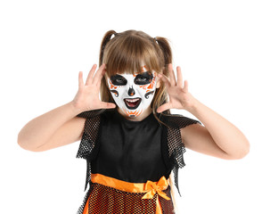 Little girl in Halloween costume on white background