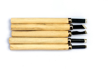 Wood carving tools on a white background.