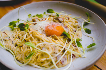 Spaghetti carbonara with onsen egg