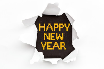 Happy New Year. Ripped paper. Bricks toys Background