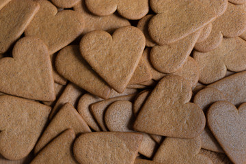Pile of gingerbread hearts for background