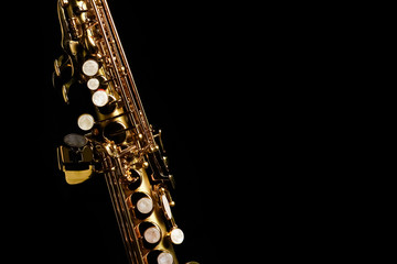 Obraz premium soprano saxophone on black background