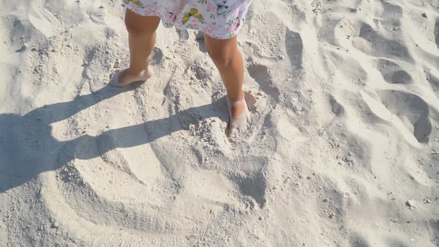 legs of a little girl playing in a squeak