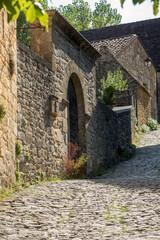  Typical French townscape with ancient housest and cobblestone street in the traditional town Beynac-et-Cazenac, France