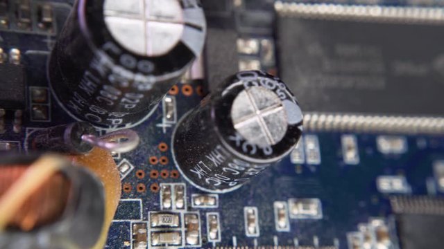 PCB Closeup Electronic Components Through-Hole Plating Capacitor SMD Chip