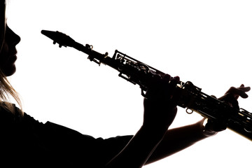 saxafon on a white background in the hands of a musician silhouette