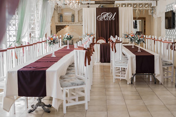 Fototapeta na wymiar wedding chairs with silk ribbon