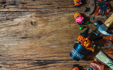 Happy Halloween day with construction DIY handy tools on grunge wood background concept. Flat lay...