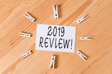 Conceptual hand writing showing 2019 Review. Concept meaning remembering past year events main...